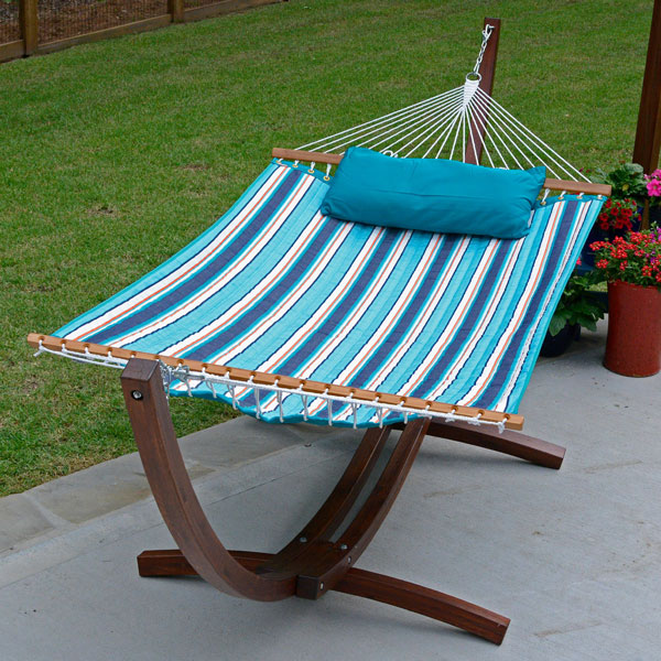 11 foot Reversible Sunbrella Quilted Hammock on patio striped side