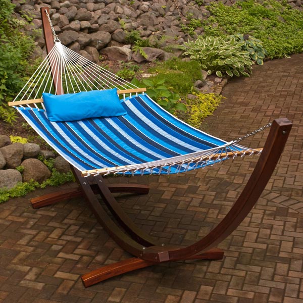 Blue Striped 11' Reversible Sunbrella Quilted Hammock on patio