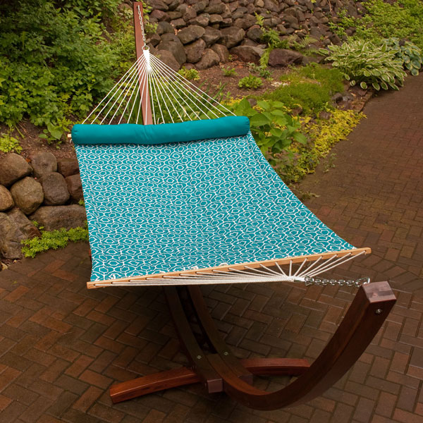 12 Foot Wood Arc Frame with Quilted Hammock and Pillow on Patio