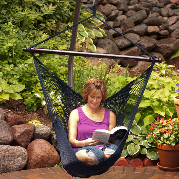 Women Reading in Navy Hanging Caribbean Rope Chair