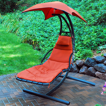 Orange Lounger Chair with Umbrella on Patio